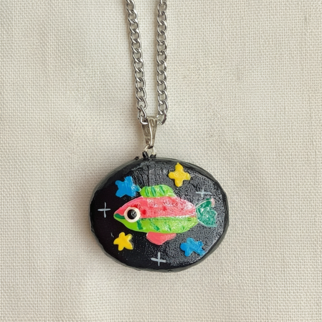 Cosmic Fish Pendant - Front View Beige Background