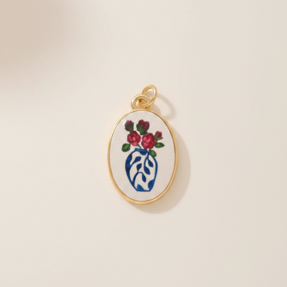 Blue white vase oval charm - cream background