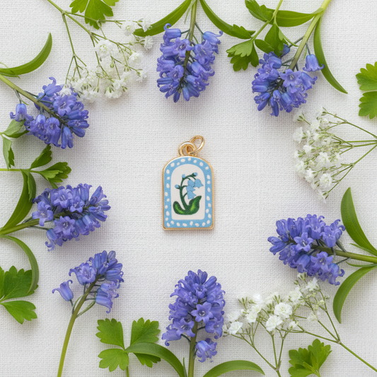 Bluebell arch charm - linen flat lay