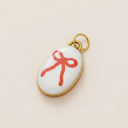 Bow Oval Charm Angle