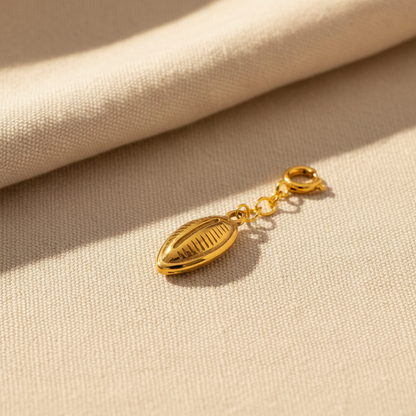 Gold Cowrie Shell Charm - Linen Texture