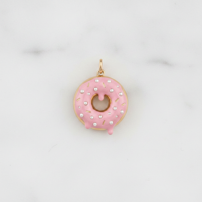 Pink donut charm flat lay marble