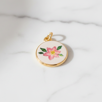 Pink camellia round charm - marble close-up