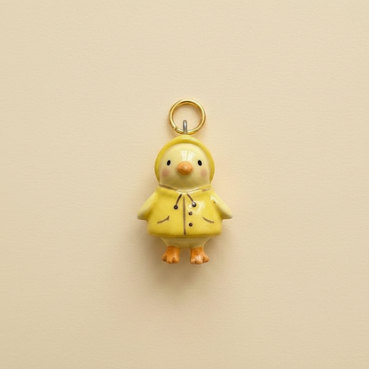 Raincoat Chick Charm - Beige Background