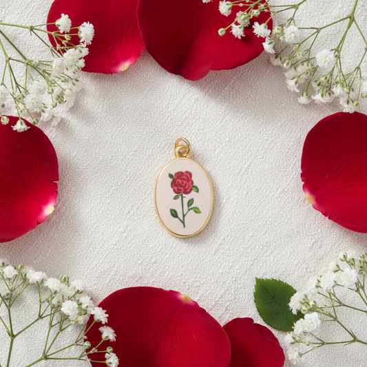 Single red rose oval charm - linen flat lay