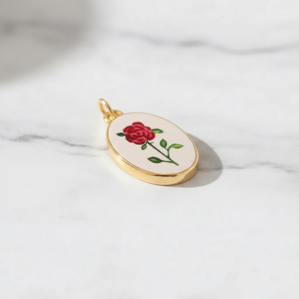 Single red rose oval charm - marble close-up
