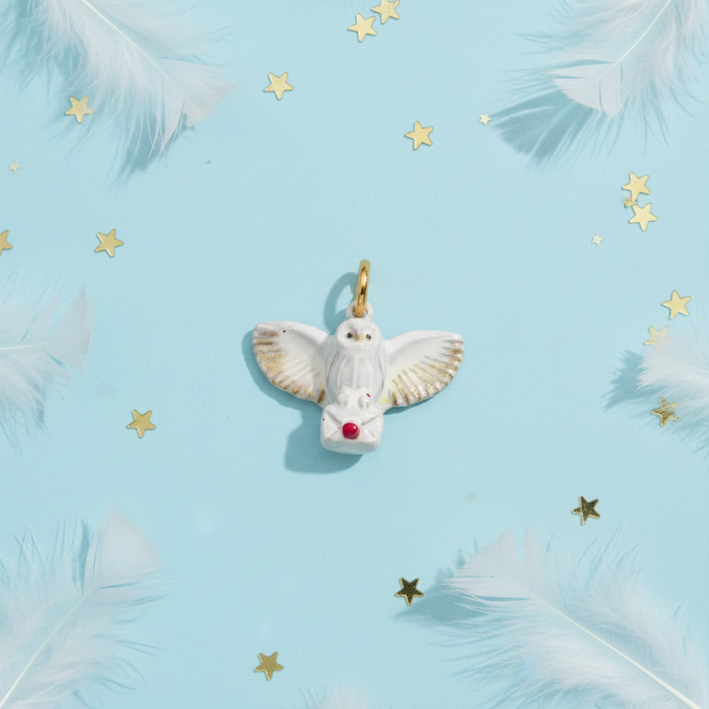 White Dove Charm - Blue Feather Flatlay